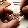 Hand-carving-golf-ball-marker Hand carving golf ball marker
